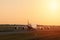 Lufthansa plane at sunset, orange light