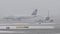 Lufthansa planes in Munich Airport, snow