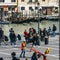 Luggage porters advertising their services in front of Venice`s Santa Lucia railway station