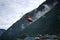 LUKLA, NEPAL - 20 SEPTEMBER 2017: Red Helicopter Leaving Tenzingâ€“Hillary Airport