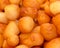 `Lukuma` fried sweet pancake balls with honey syrup, nuts and cinnamon