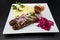 Lula kebab.Kebab.Traditional Oriental dish, barbecue shish kebab. Lamb, onions, cabbage, mashed potatoes spicy tomato sauce on pla