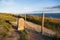 Lulworth Cove Campsite Mile Stone and Coast Path at Sunset