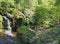 lumb hole falls a waterfall in woodland at crimsworth dean near pecket well in calderdale west yorkshire