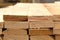 Lumber warehouse of finished products for construction close-up