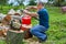 Lumberjack refilling his chainsaw