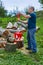 Lumberjack refilling his chainsaw