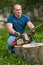 Lumberjack servicing his chainsaw