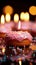 Luminous backdrop pink donut, flickering candle amidst bokeh lights, a captivating scene