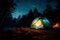 A luminous blue tent beneath a starry forest evening, with a sunset backdrop