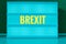 Luminous sign with inscription in German Brexit, symbolizing the withdrawal of Great Britain from the EU