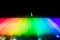 luminous spectrum composed of prisms and projected on a wall wit