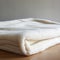 Luminous White Felt Blanket: Consumer Culture Critique In 32k Uhd