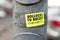 Luminous yellow Bollocks to Brexit sticker stuck on a lamp post