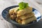 Lumpia Spring Rolls on Wooden Table in Restaurant