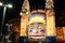 Luna Park main gate with Ferris wheel blur lighted at night