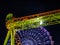 Luna park with roller coaster and observation wheel in Ayia Napa, Cyprus