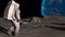 Lunar Astronaut In Space Suit Walking On the Moon. Planet Earth Is Visible. 3d rendring animation