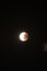 Lunar eclipse in the black night sky