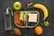 Lunch box with healthy food on black table background