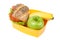 Lunch box with sandwich, apple banana