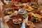 Lunch. Cafe Table With Different Food. Group Of Women Eating In Restaurant.