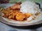 lunch with egg stew and warm rice on the dining table