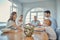 Lunch, praying and family together at dining room table in home. Grandparents, child and parent teaching grace or