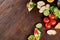 Lunch sandwich with cheese and vegetables served with citrus and coffee, selective focus, close-up, top view