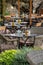 Before lunch time, empty stylish cafes with served tables waiting for guests in sunny Saint-Tropez, Provence, France