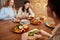 Lunch. Young Women Eating In Cafe. Smiling Girls Having Breakfast And Talking. Friends Meeting In Restaurant