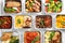 Lunchboxes on white wooden table. Healthy food delivery