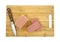 Luncheon meat sliced on cutting board