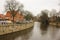 Luneburg, Germany - 10.12.2017: Medieval traditional European houses and Ilmenau river. Winter in Europe