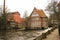 Luneburg, Germany - 10.12.2017: Medieval traditional European houses on stone pavement. Winter in Europe