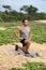 Lunge exercise - man doing lunges exercising legs. Male fitness model doing alternating bodyweight Lunge workout training glutes,