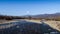 Lunigiana winter landscape view near Villafranca. Magra River and mountains behind.