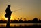Lure fishing. fisherman fishing at sunset