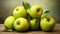 Luscious Green Apples Gracefully Resting on a Rustic, Unprocessed Paper Background.