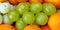 Luscious Harvest: A Close Up of Vibrant Grapes and Juicy Oranges. Generative AI