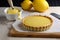 luscious lemon curd filling in delicate pastry crust for tart and sweet dessert