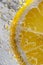 Luscious Lemon: A Vibrant Closeup of Zesty Citrus and Bubbly Del