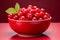 Luscious ripe cranberry fruit isolated on a vibrant red background, high quality image