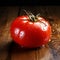 A Luscious Ruby Tomato Resting on Rustic Wood