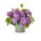 The lush bouquet of lilac in a ceramic vase.