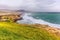 Lush green landscape and Seascape, Al Mughsayl Rocky Beach, Salalah, Oman