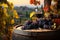 In a lush vineyard, red wine and a barrel offer scenic beauty