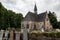 Luss Parish Church dedicated to Saint Kessog with a graveyard in front of it