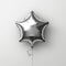 A lustrous star-shaped balloon with a sleek metallic finish captures