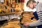 Luthier checking the body of an acoustic guitar